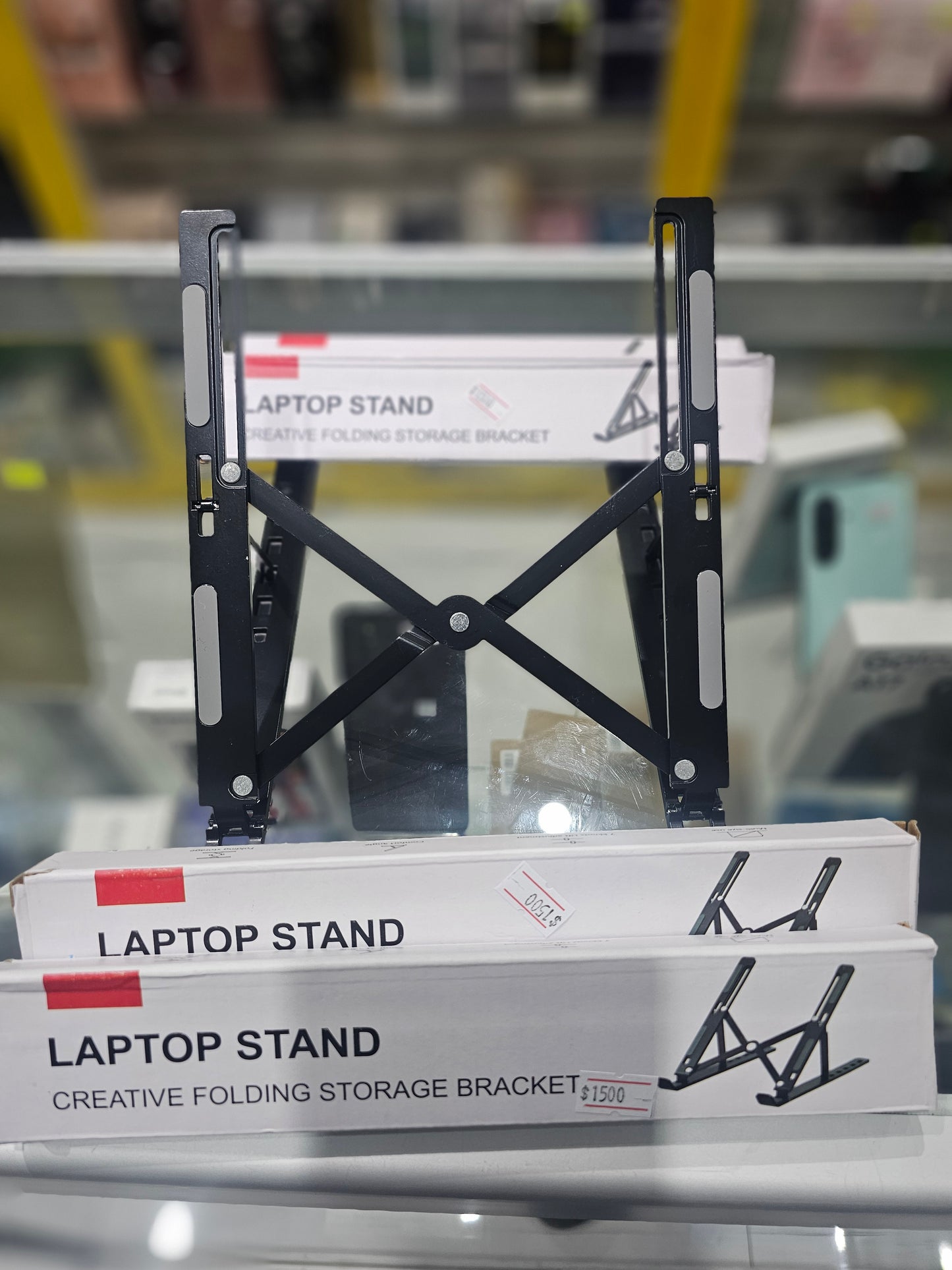 Laptop creative folding storage bracket